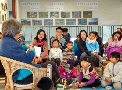 children & parents listening stories re how snakes live in our farm field1